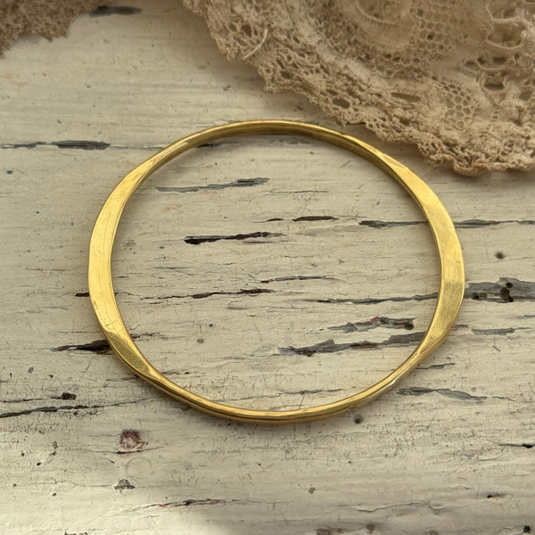 Organic gold bangle