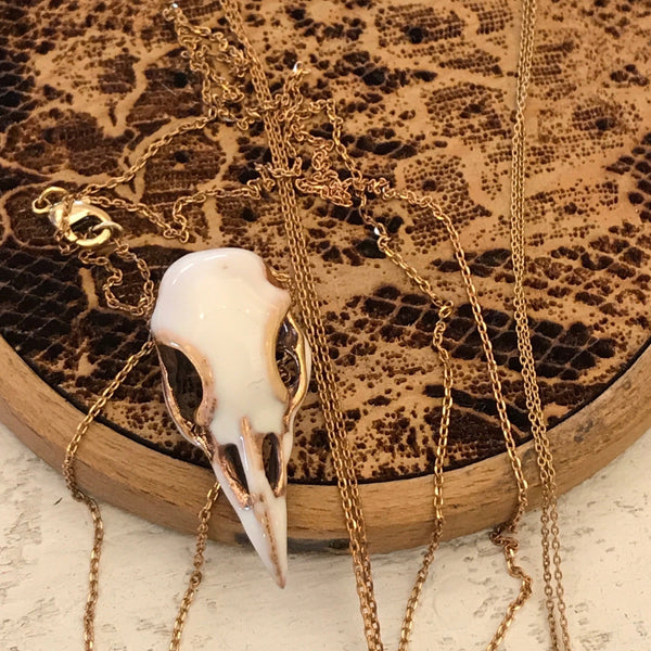 'Bird skull' white necklace | Bronze