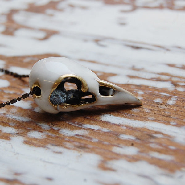 'Bird skull' white necklace | Bronze